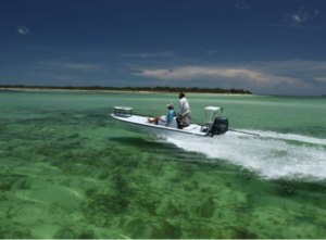 Two people in a speedboat in the Florida Keys National Marine Santuary