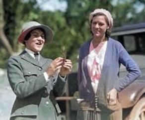 Park ranger/naturalist, Polly Mead, discussing plant identification with a park visitor, June 1931